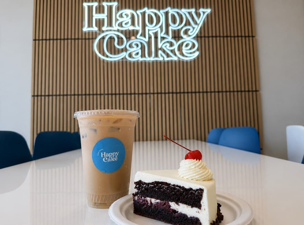 Cake slice and HappyCake iced coffee